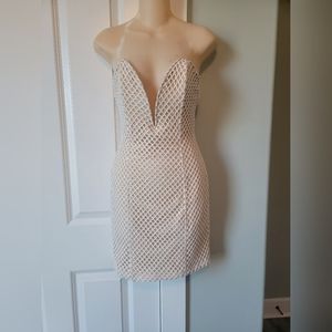 Gorgeous strapless Nude underlay Mini dress.